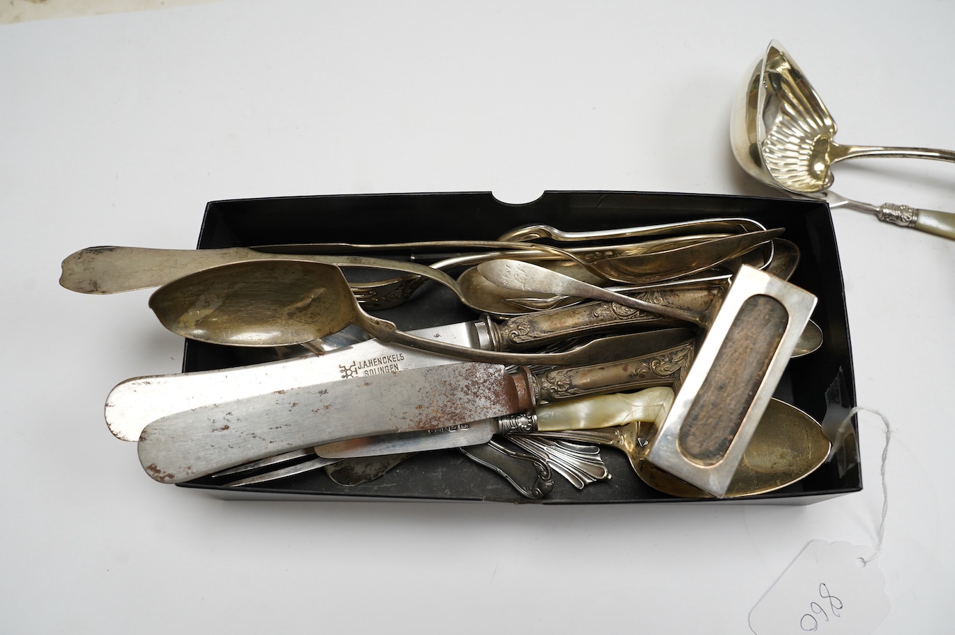 A group of German 800 and other white metal cutlery, an 800 card case, silver bonbon dish, match sleeve and minor silver flatware. Condition - poor to fair